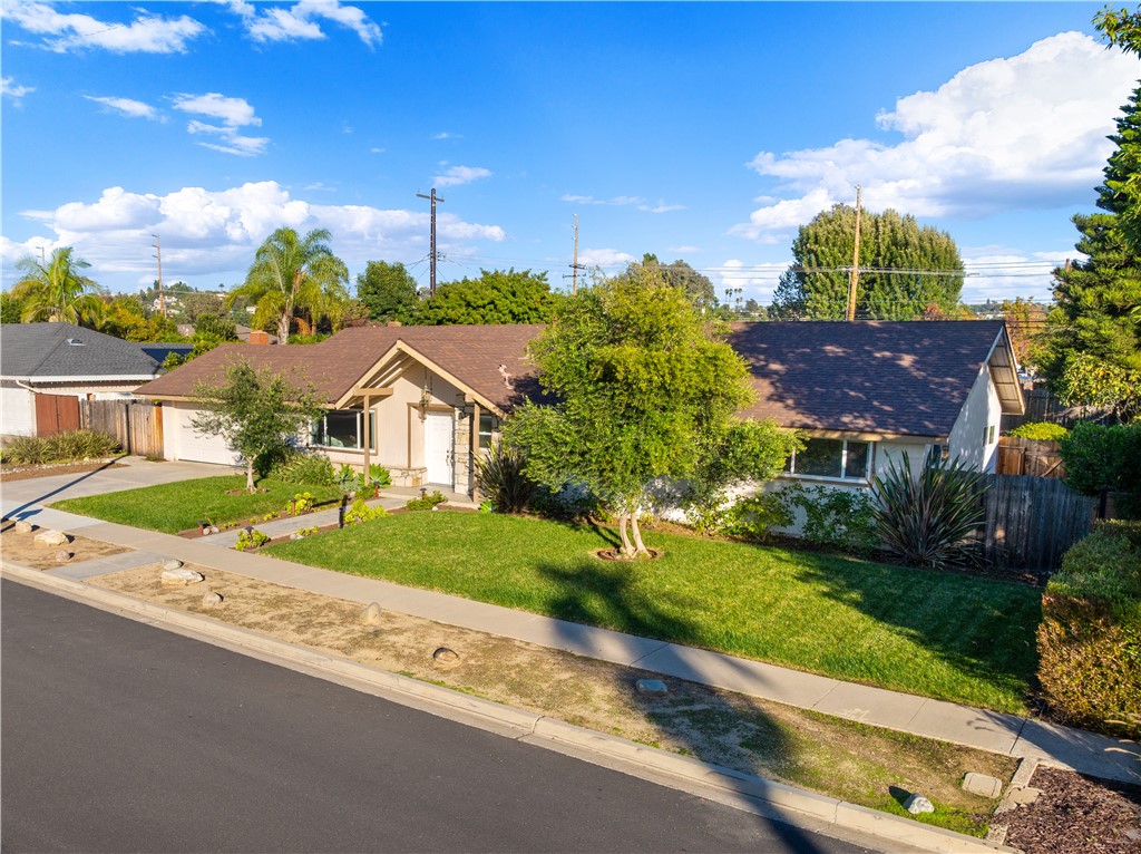 13402 Winthrope Street North Tustin, CA 92705 - Photo 32 of 34 a house view with a garden space