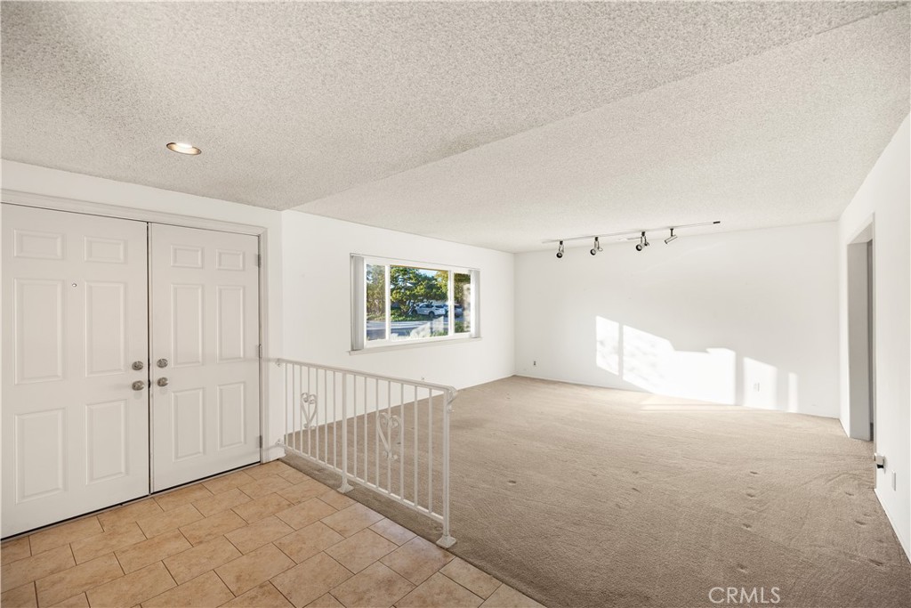 13402 Winthrope Street North Tustin, CA 92705 - Photo 5 of 34 a view of a hallway
