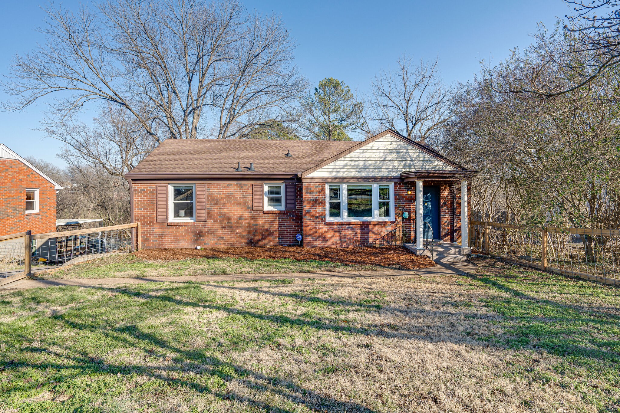 919 Mitchell Road Nashville, TN 37206 - Photo 1 of 26 a front view of a house with a garden