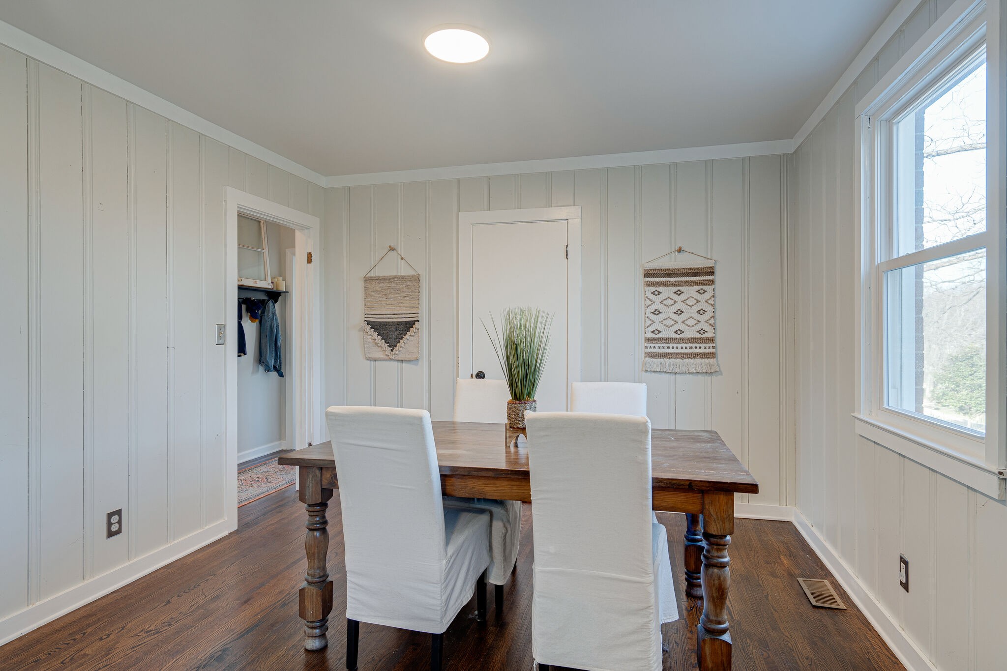 919 Mitchell Road Nashville, TN 37206 - Photo 11 of 26 a view of a dining room with furniture and a window