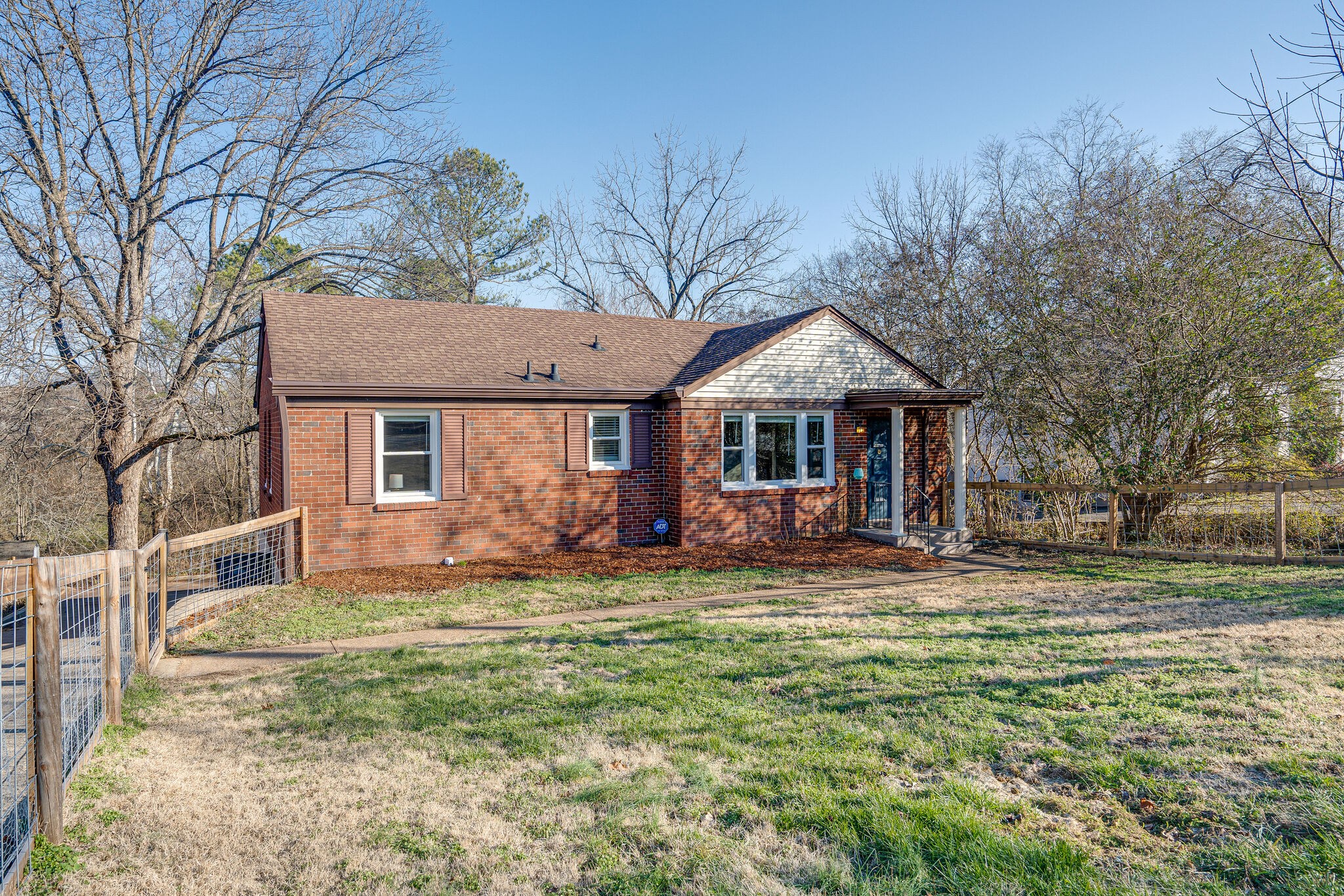 919 Mitchell Road Nashville, TN 37206 - Photo 2 of 26 a front view of a house with a yard