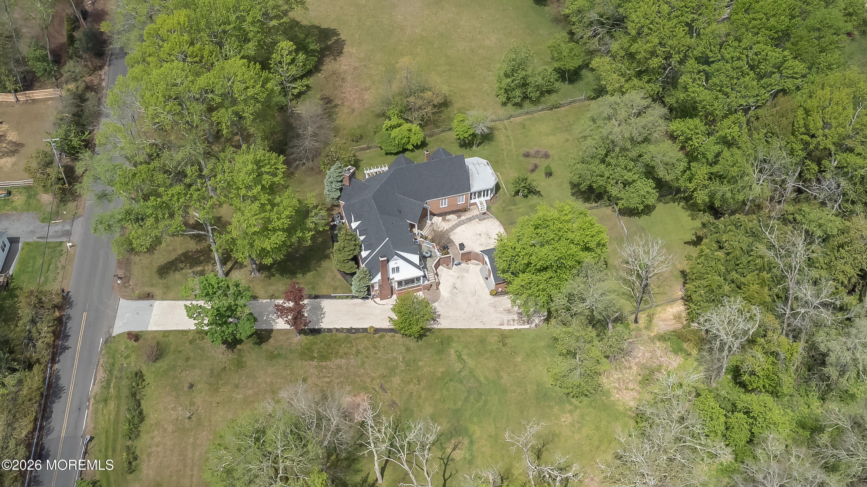187 Hockhockson Road Colts Neck, NJ 07722 - Photo 52 of 55 an aerial view of residential house with green space