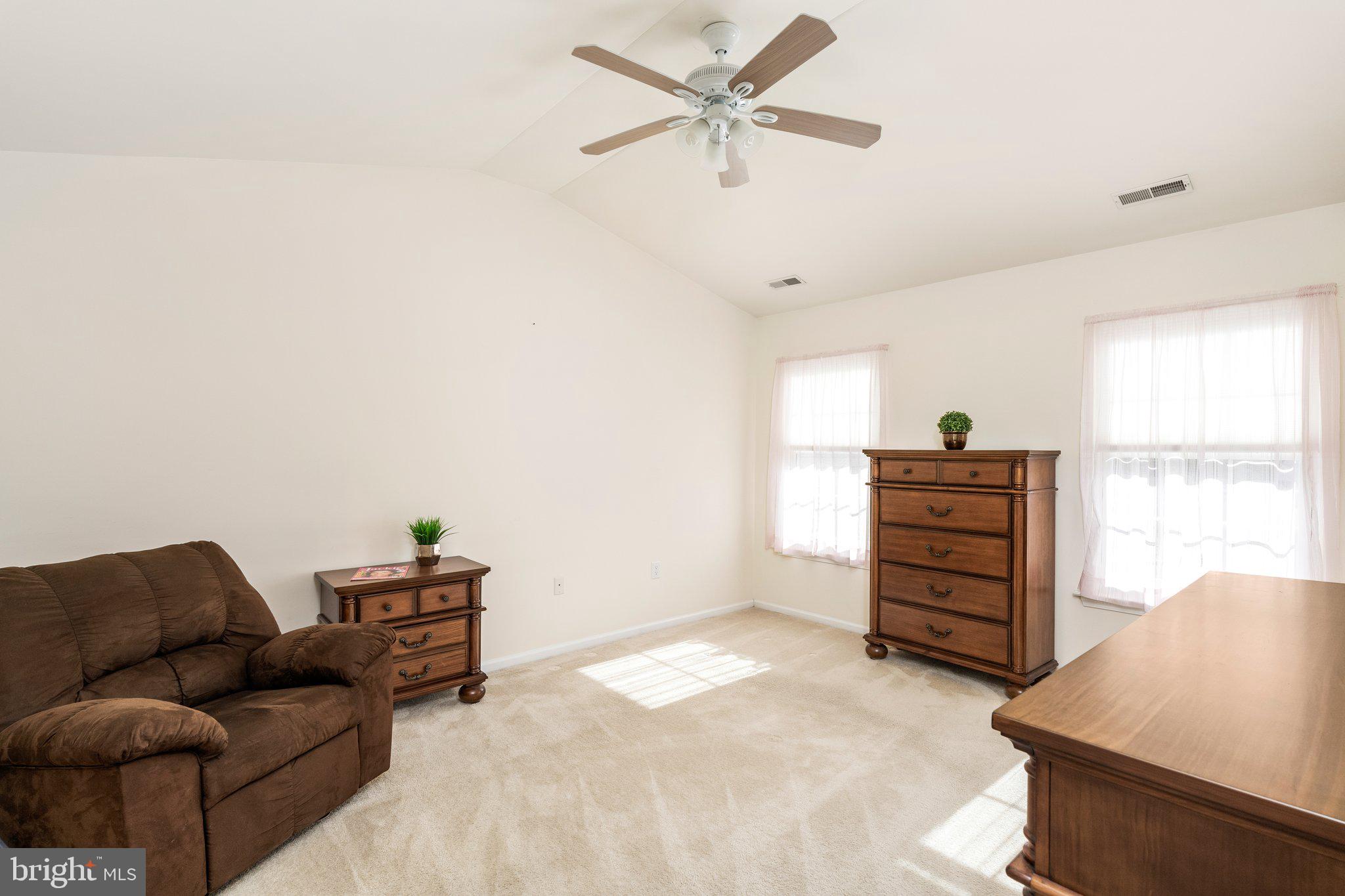 26 Brecht Road Hamilton, NJ 08690 - Photo 14 of 25 a living room with furniture and a window