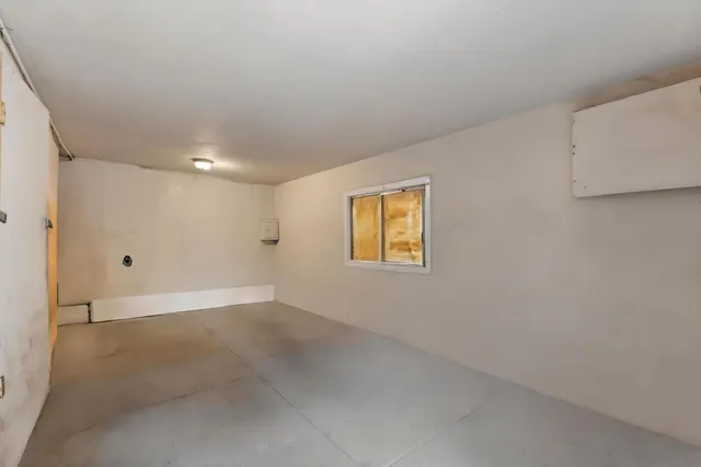 en empty room with windows