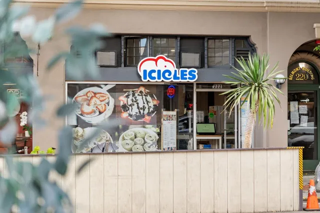 a view of a street with sitting area