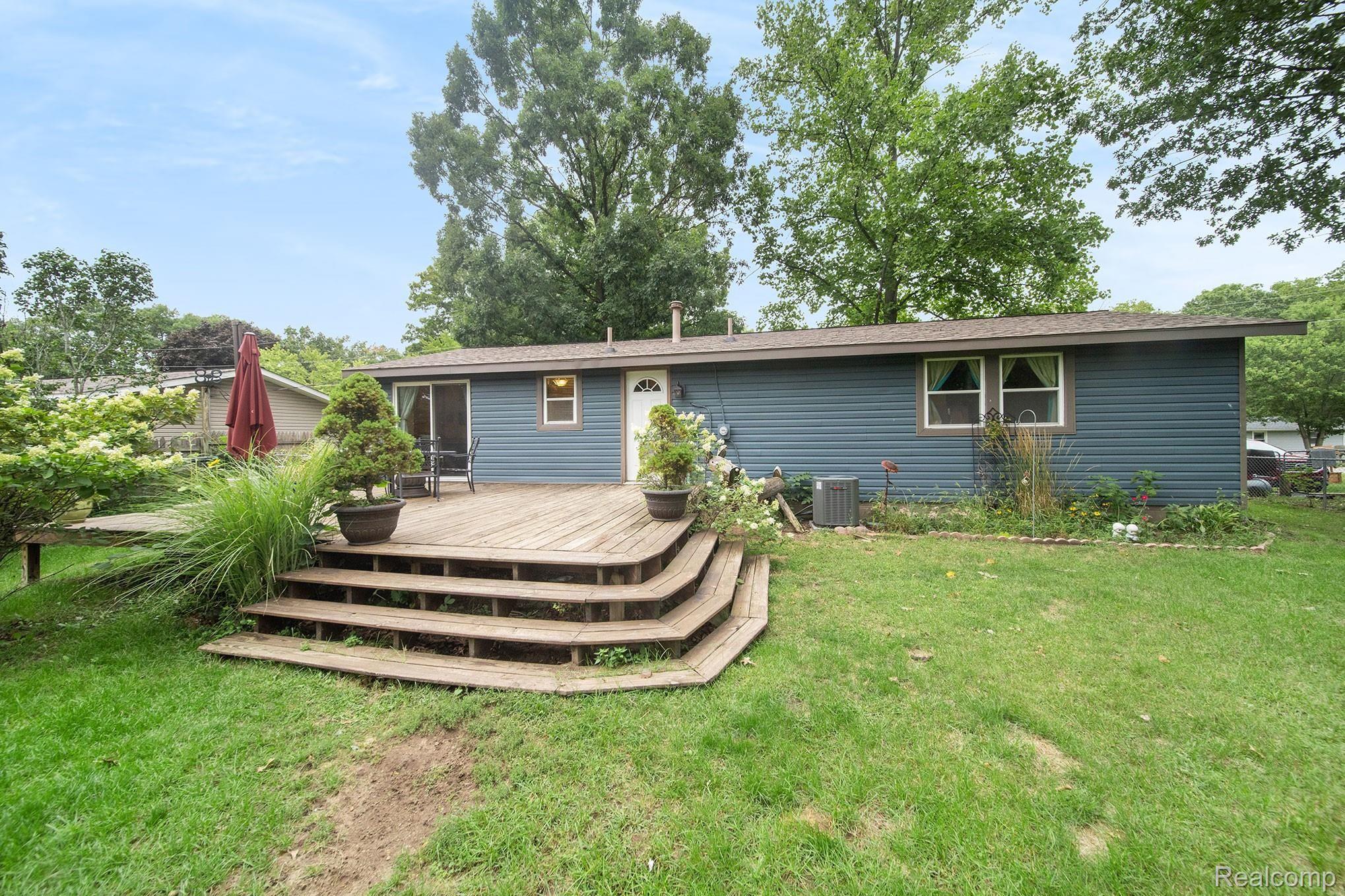 667 Snyder Road Highland, MI 48357 - Photo 19 of 20 Deck Space with entertaining and dining in mind