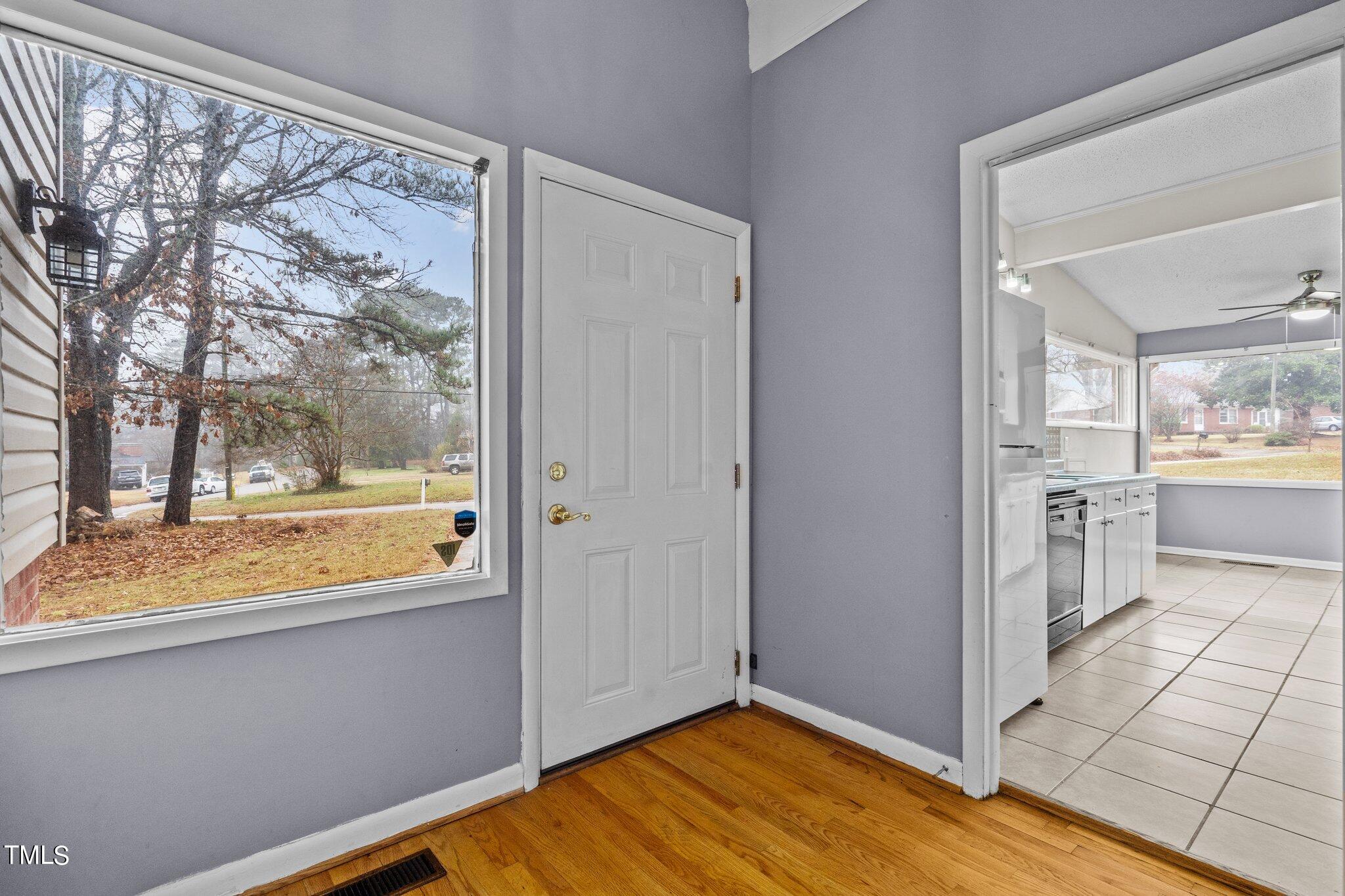 3500 Baugh Street Raleigh, NC 27604 - Photo 6 of 34 a view of a room with wooden floor and a window