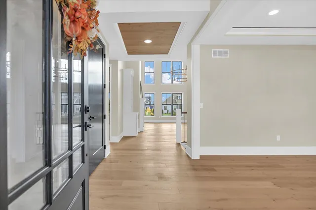 a kitchen with kitchen island a stove a sink and a refrigerator