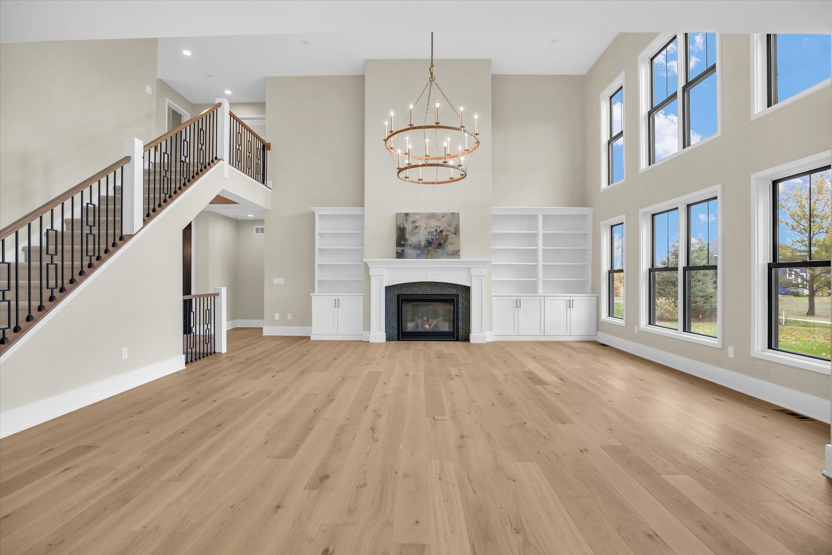 2709 East Castlerock Drive Urbana, IL 61802 - Photo 23 of 117 a view of an empty room with wooden floor fireplace and a window