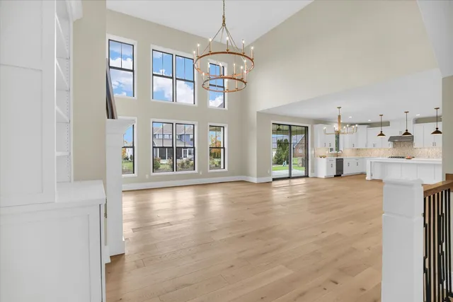 a white bath tub sitting next to a shower