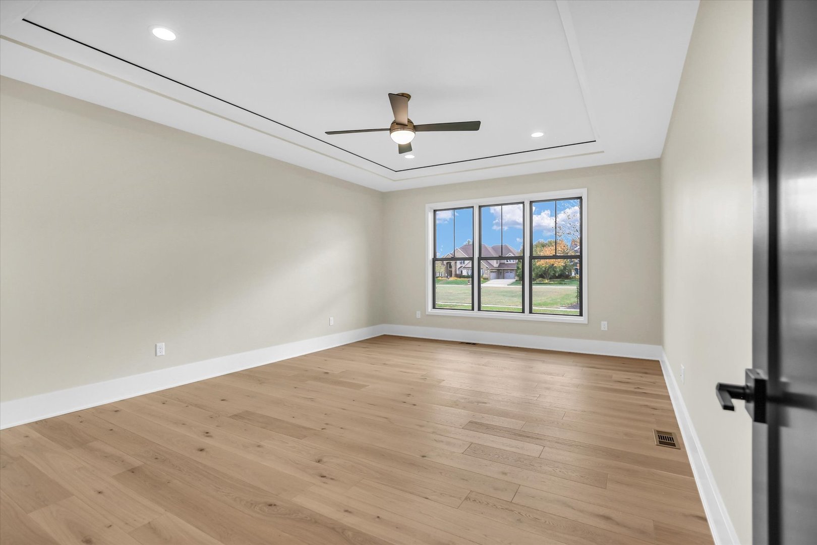 2709 East Castlerock Drive Urbana, IL 61802 - Photo 49 of 117 wooden floor in an empty room with a window