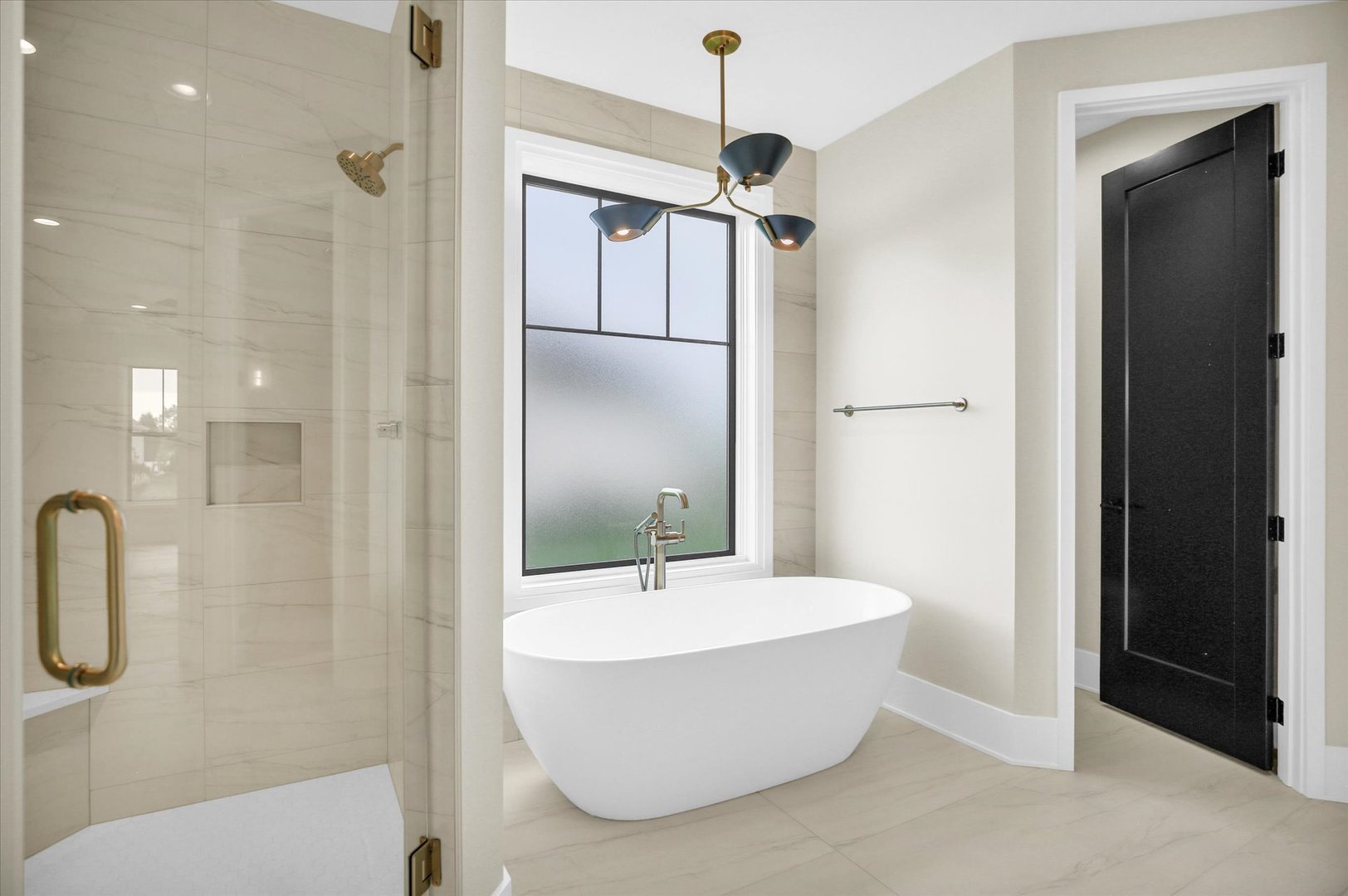 2709 East Castlerock Drive Urbana, IL 61802 - Photo 54 of 117 a bathroom with a white bath tub sitting next to a bathroom sink