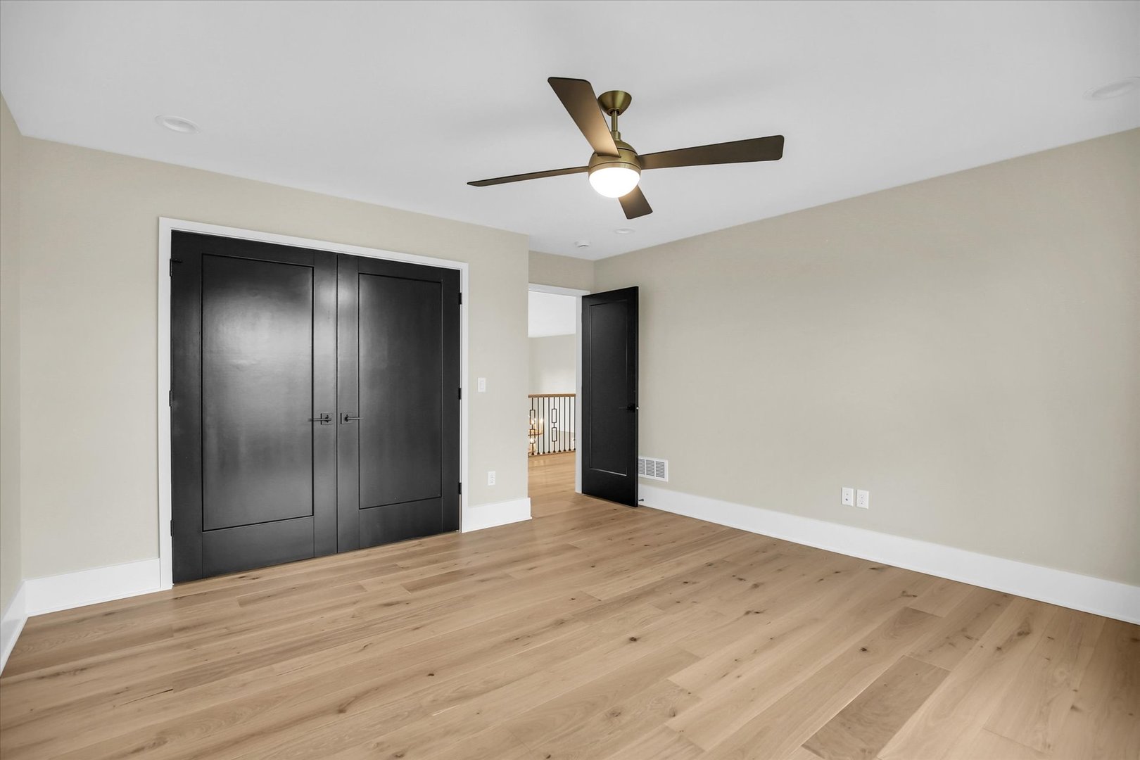 2709 East Castlerock Drive Urbana, IL 61802 - Photo 68 of 117 a view of empty room with wooden floor
