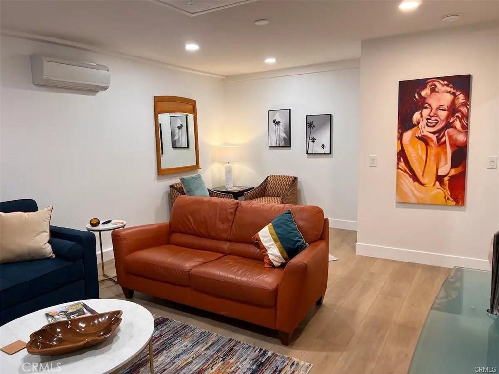 41830 6th Street Temecula, CA 92590 - Photo 5 of 8 a living room with furniture and a rug
