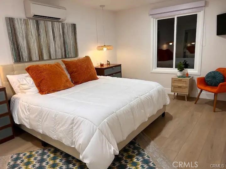 41830 6th Street Temecula, CA 92590 - Photo 6 of 8 a bedroom with bed and window