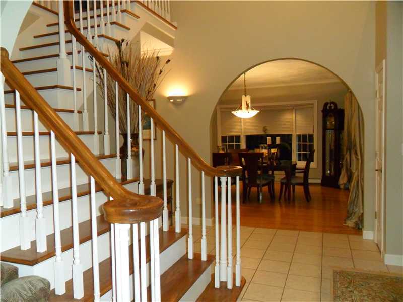 2 King Phillip Road Lincoln, RI 02865 - Photo 4 of 20 Entry. LARGE FOYER FEATURES TWO COAT CLOSETS, OPEN TO DINING ROOM AND LIVING ROOM