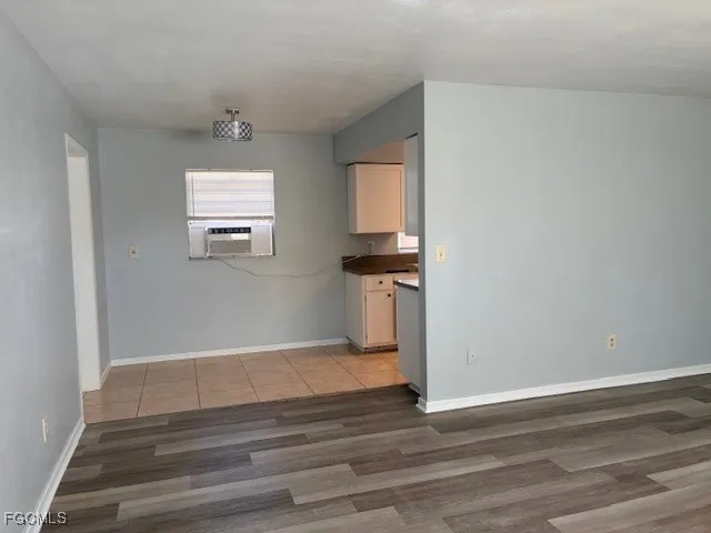 a view of a livingroom with wooden floor