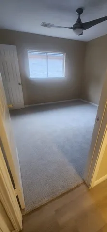 a bathroom with a toilet and a bathtub