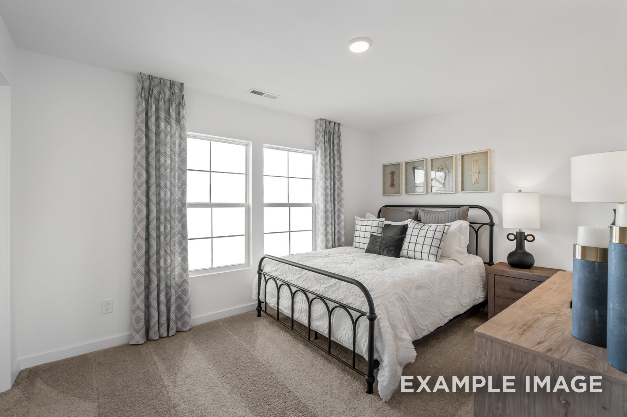 1733 Elliott Williams Way Gallatin, TN 37066 - Photo 20 of 23 a bedroom with a large bed and a night stand