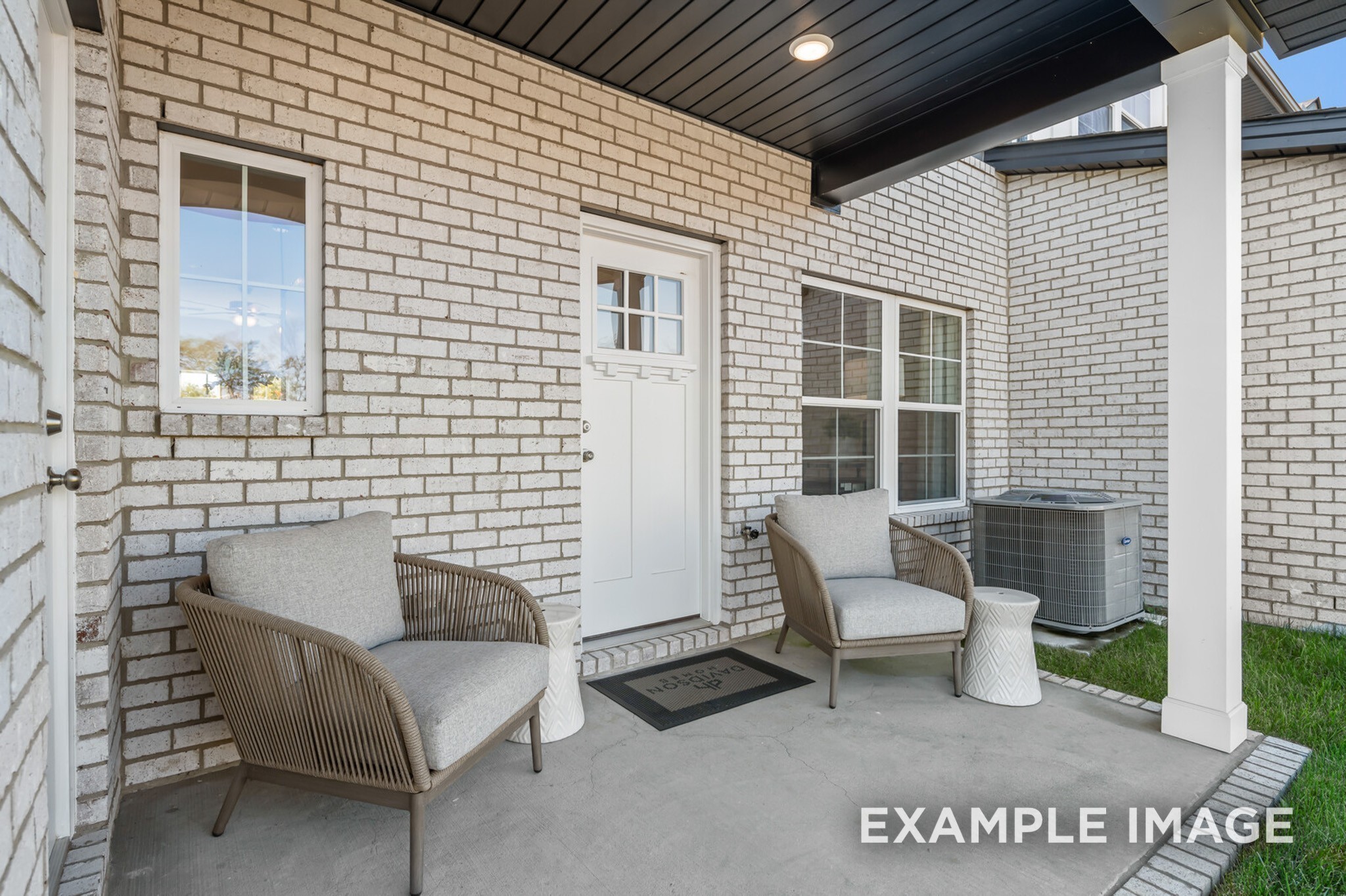 1733 Elliott Williams Way Gallatin, TN 37066 - Photo 22 of 23 a view of a patio with a table and chairs