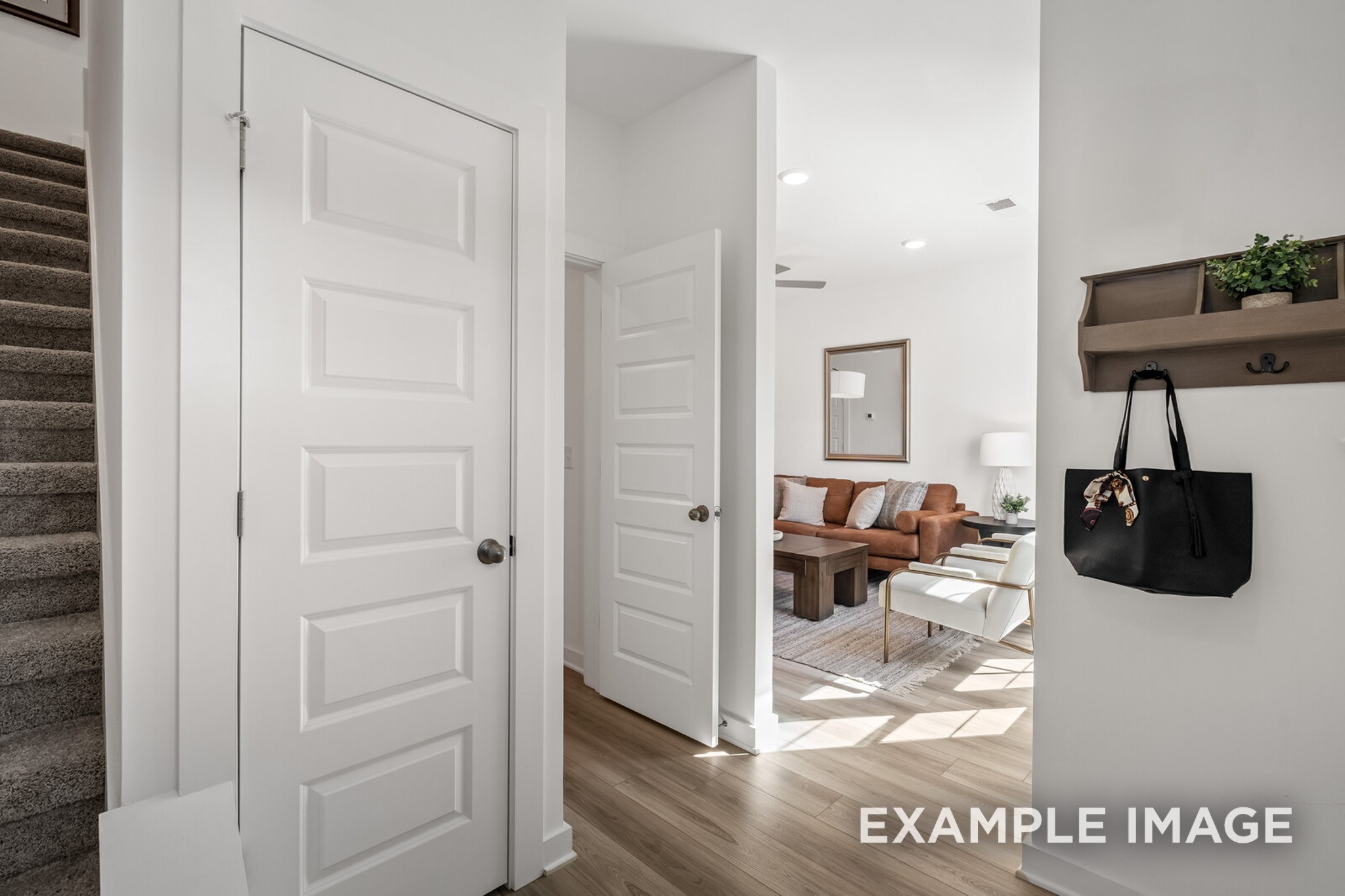 1733 Elliott Williams Way Gallatin, TN 37066 - Photo 7 of 23 a living room with furniture and a flat screen tv