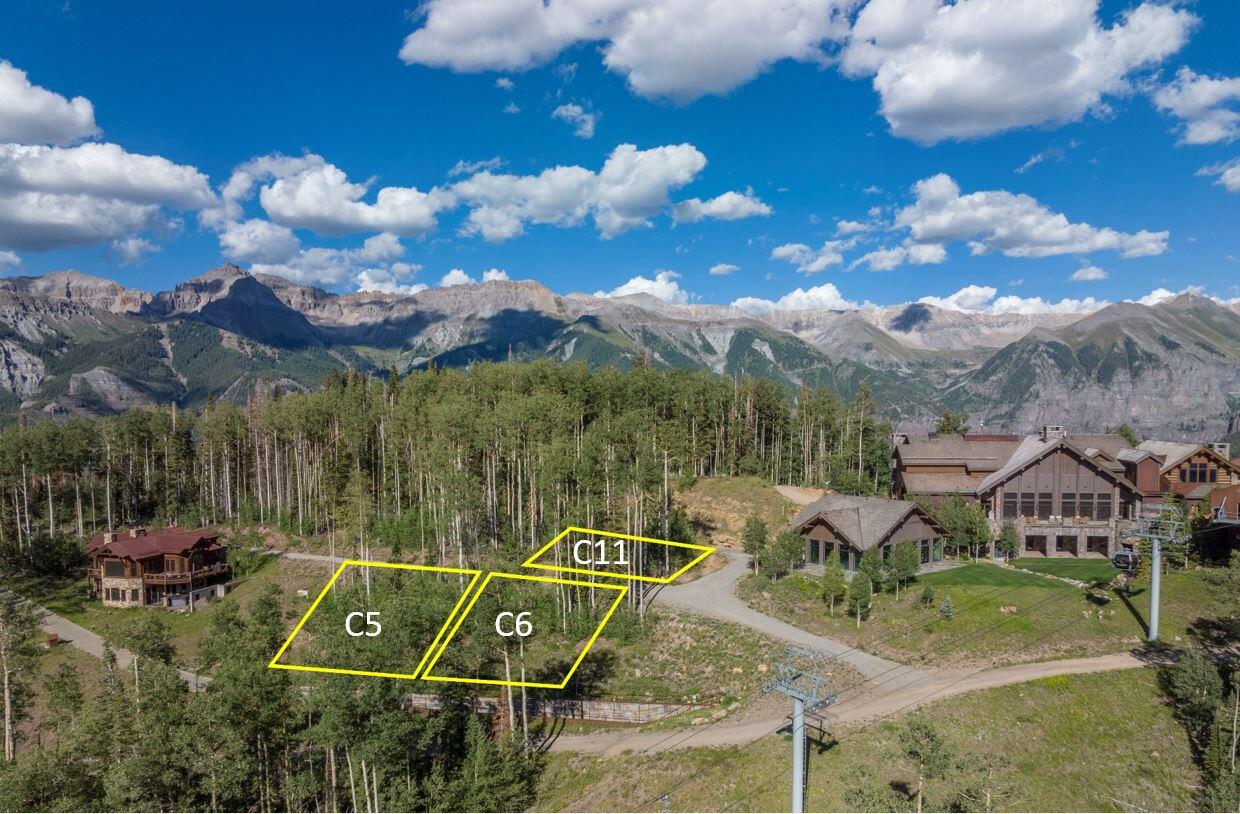 11 Coonskin Ridge Lane Mountain Village, CO 81435 - Photo 15 of 19 a view of a houses with a swimming pool