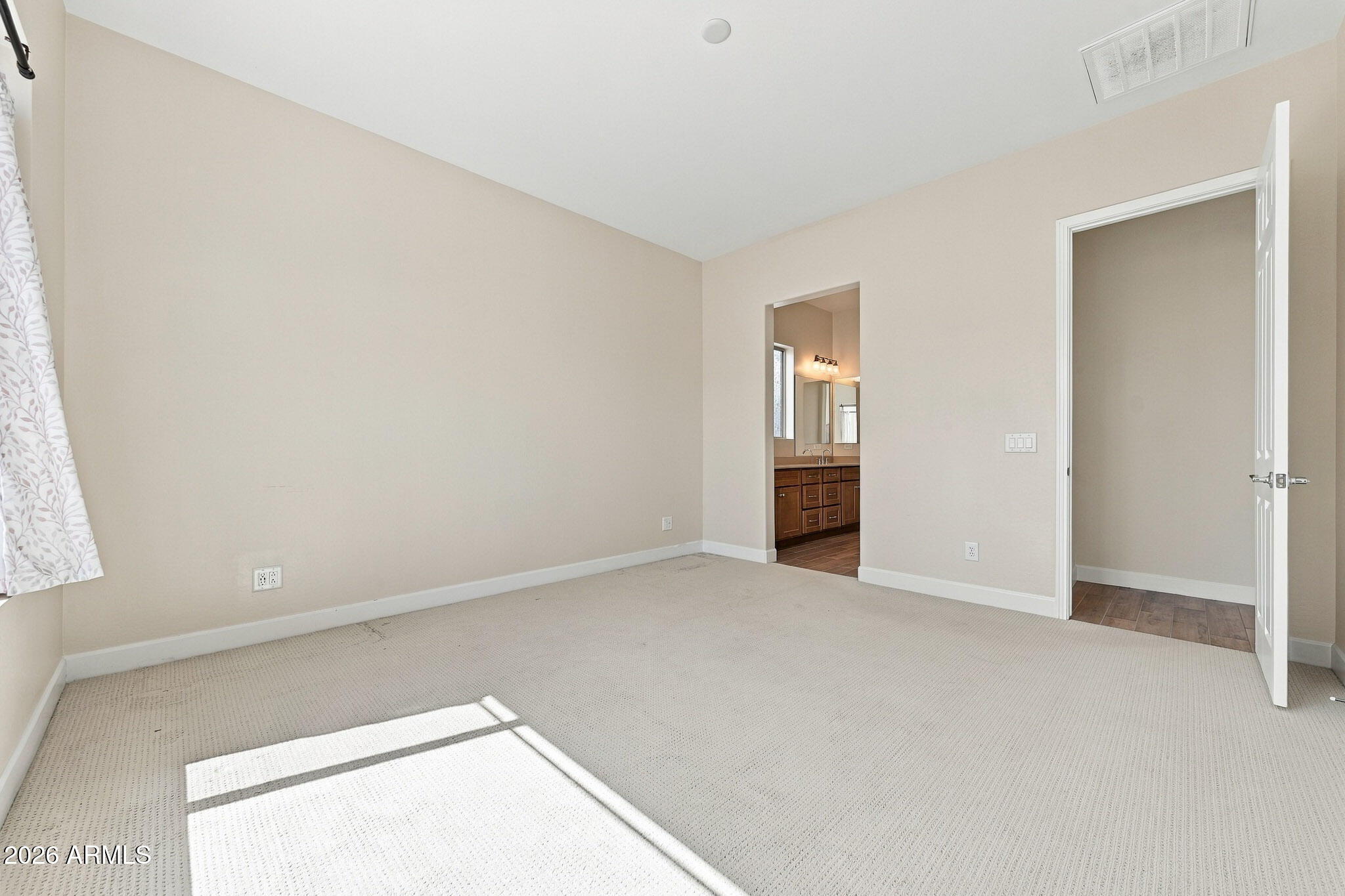 16837 West Almeria Road Goodyear, AZ 85395 - Photo 12 of 34 Primary Bedroom