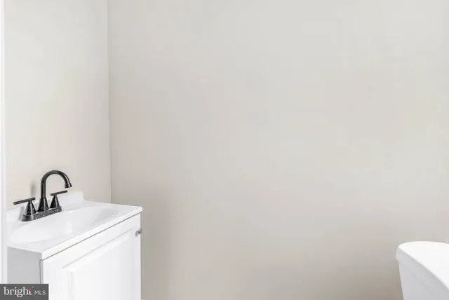 a sink with a close up of bulb