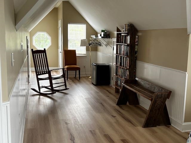 114 A 6th Avenue South Surfside Beach, SC 29575 - Photo 3 of 20 Sitting room featuring wainscoting, light wood-type flooring, and vaulted ceiling