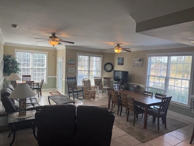 114 A 6th Avenue South Surfside Beach, SC 29575 - Photo 6 of 20 Dining area with a ceiling fan, ornamental molding, and light tile patterned floors