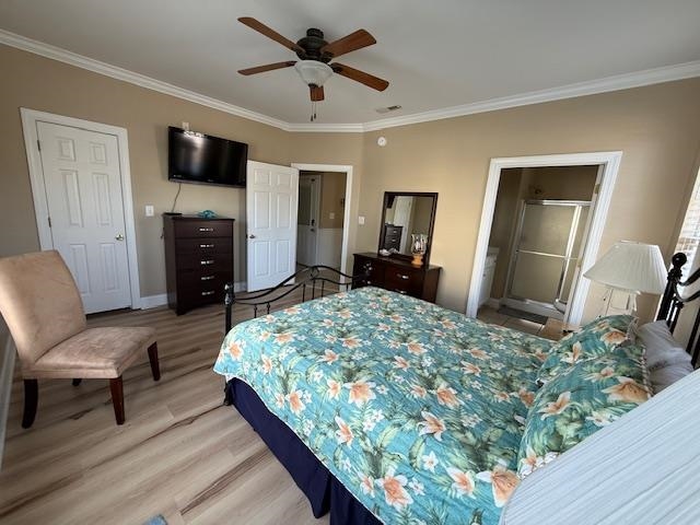 114 A 6th Avenue South Surfside Beach, SC 29575 - Photo 10 of 20 Bedroom featuring crown molding, light wood-style flooring, a ceiling fan, and connected bathroom