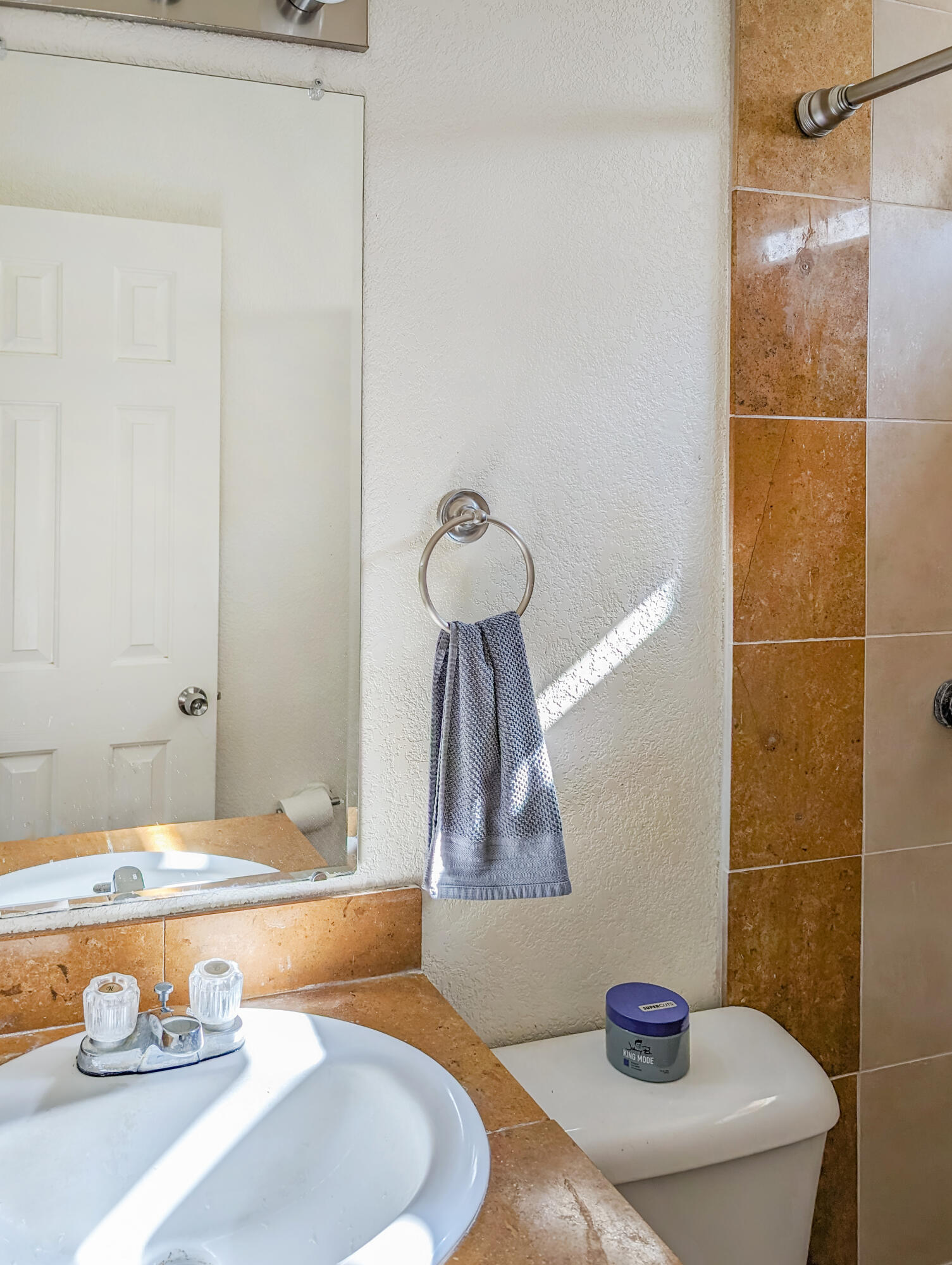 70200 Dillon Road, Unit 328 Desert Hot Springs, CA 92241 - Photo 17 of 25 a bathroom with a sink and a tub