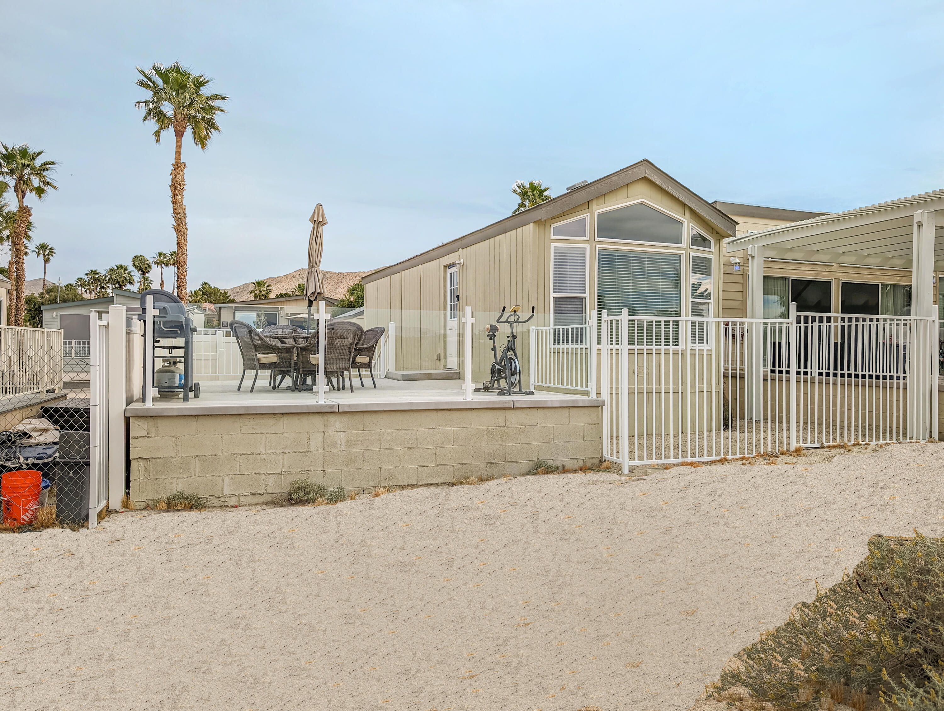 70200 Dillon Road, Unit 328 Desert Hot Springs, CA 92241 - Photo 2 of 25 a view of a house with a outdoor space