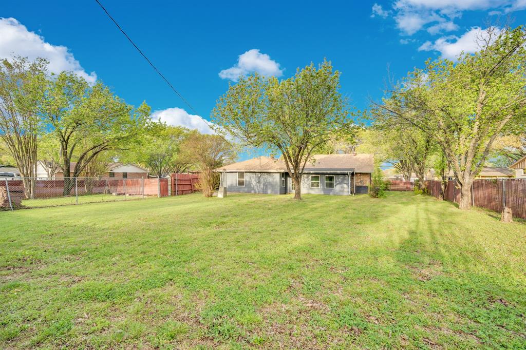 100 North Valley Street Red Oak, TX 75154 - Photo 20 of 31 a view of a house with a big yard