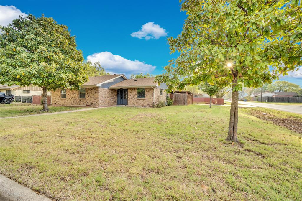 100 North Valley Street Red Oak, TX 75154 - Photo 22 of 31 a view of a house with a yard