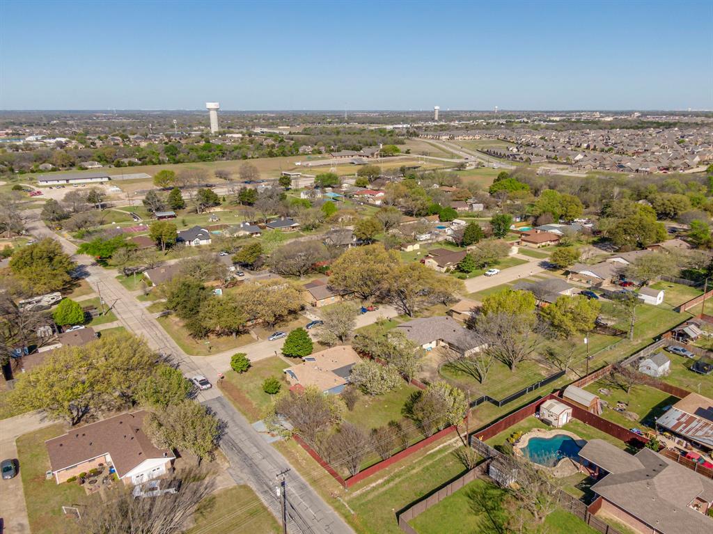 100 North Valley Street Red Oak, TX 75154 - Photo 23 of 31 an aerial view of residential building and parking space