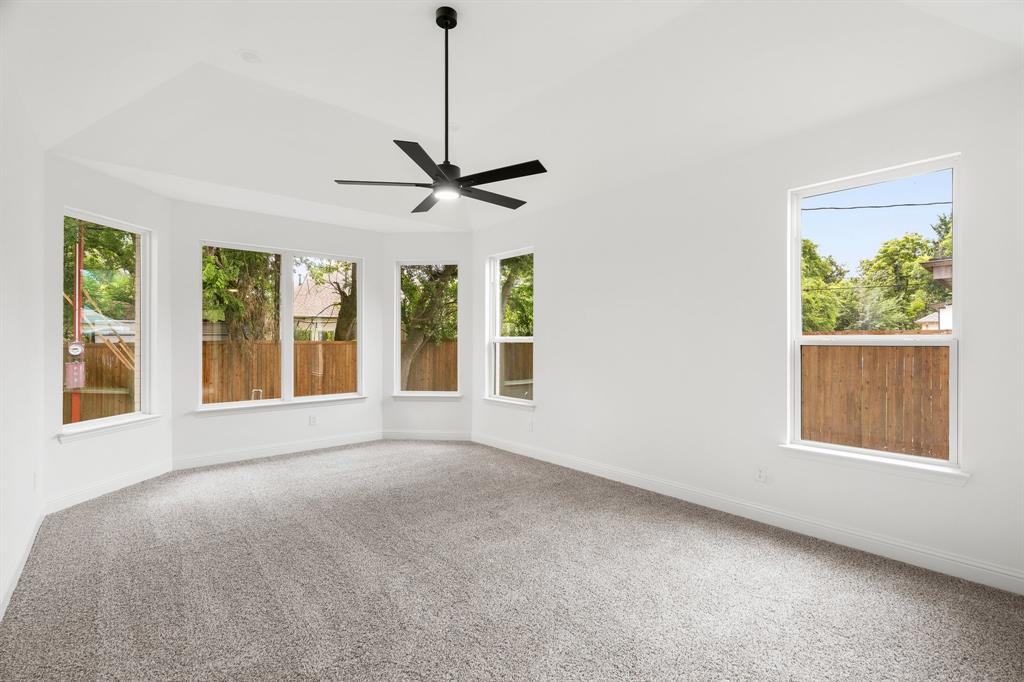 848 Northwood Road Fort Worth, TX 76107 - Photo 14 of 40 a view of an empty room with a window