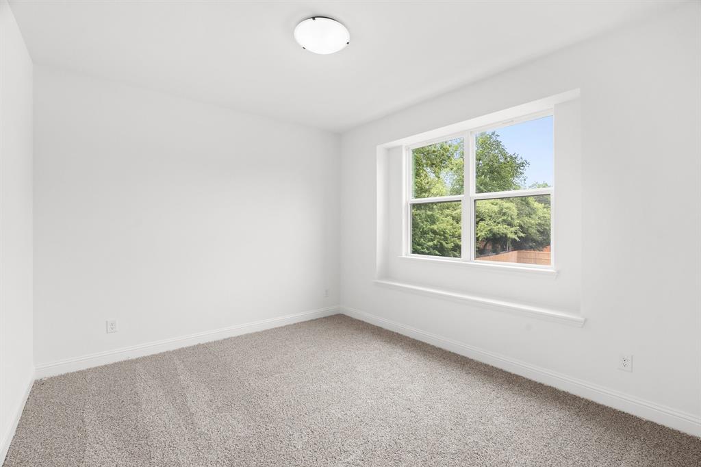 848 Northwood Road Fort Worth, TX 76107 - Photo 26 of 40 an empty room with a window