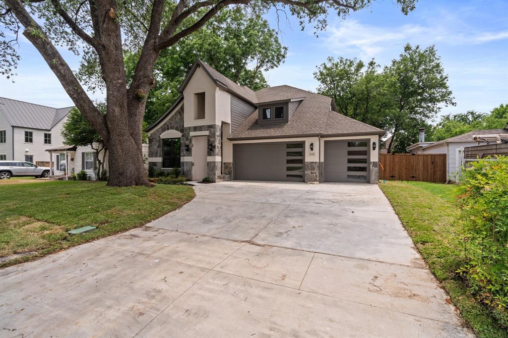 848 Northwood Road Fort Worth, TX 76107 - Photo 33 of 40 a front view of house with yard and green space