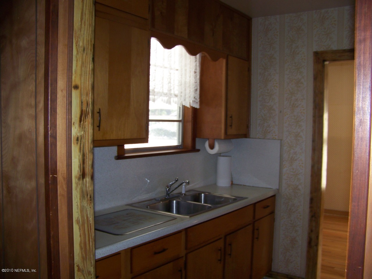 9761 Kline Road Jacksonville, FL 32246 - Photo 14 of 71 a bathroom with a sink and a mirror