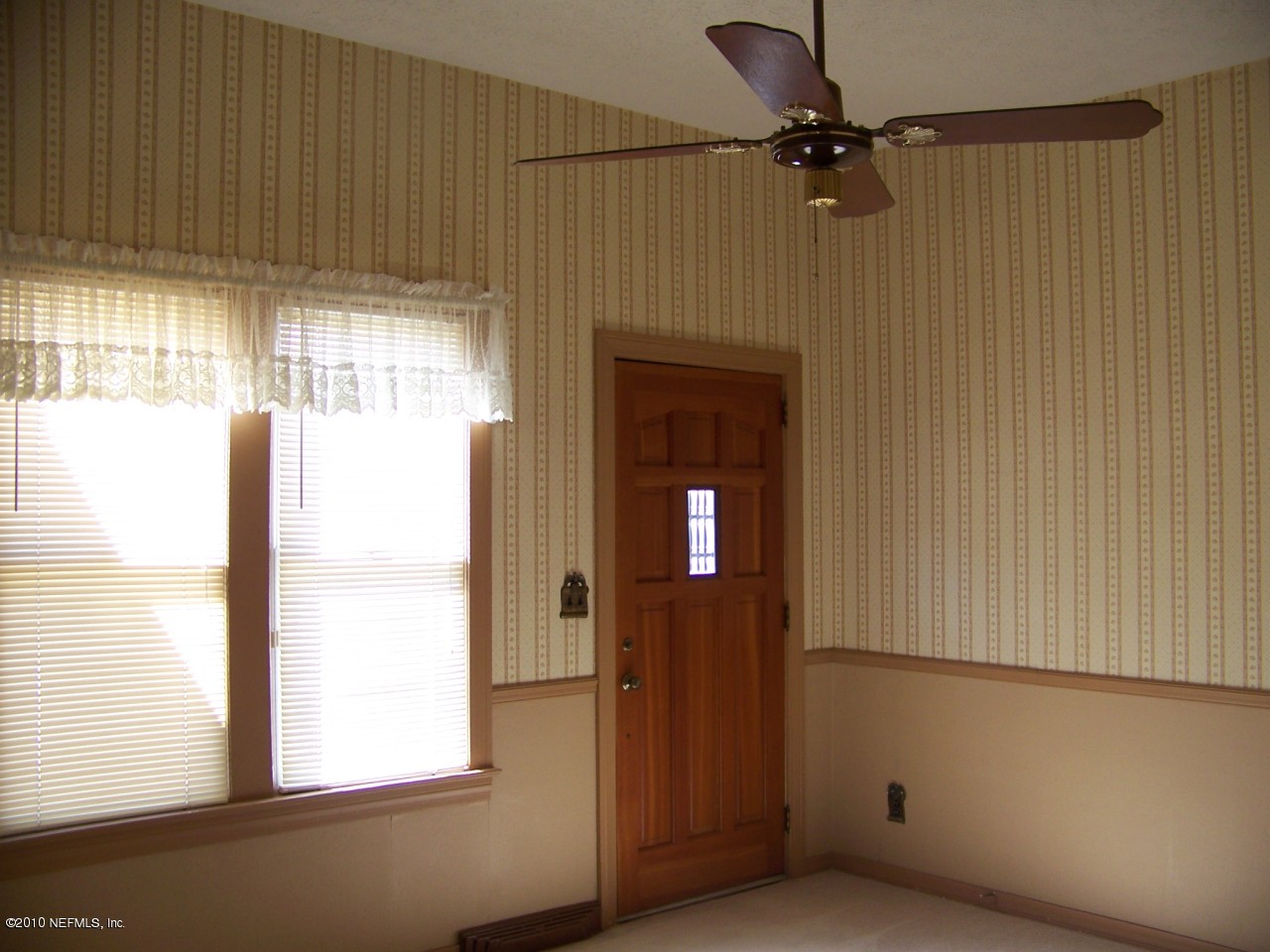9761 Kline Road Jacksonville, FL 32246 - Photo 20 of 71 a view of an empty room with a window