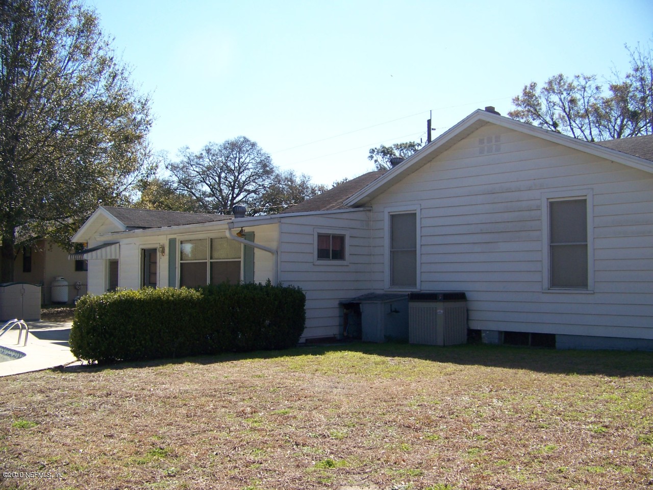 9761 Kline Road Jacksonville, FL 32246 - Photo 51 of 71 a front view of a house with a yard