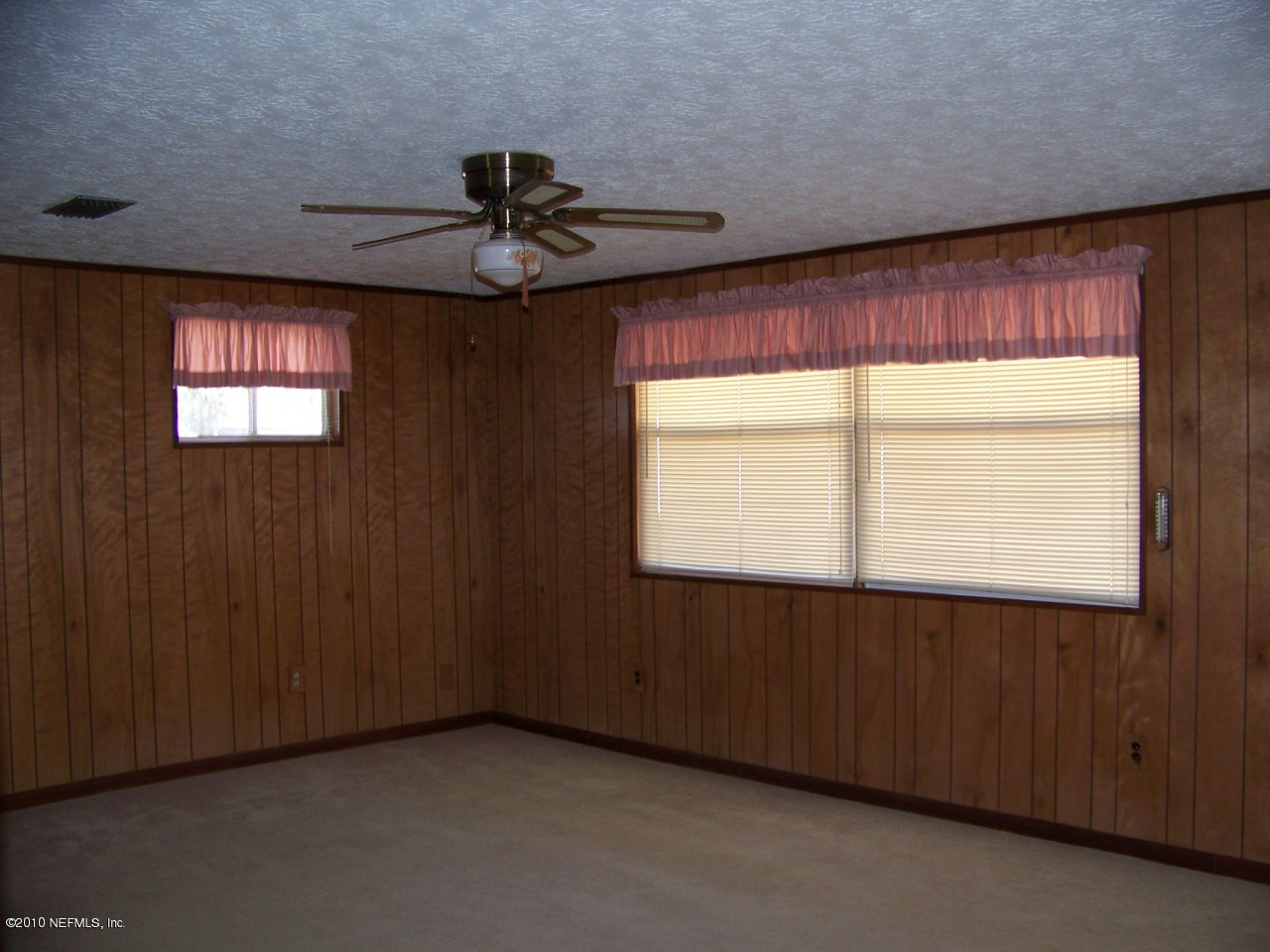 9761 Kline Road Jacksonville, FL 32246 - Photo 6 of 71 an empty room with windows