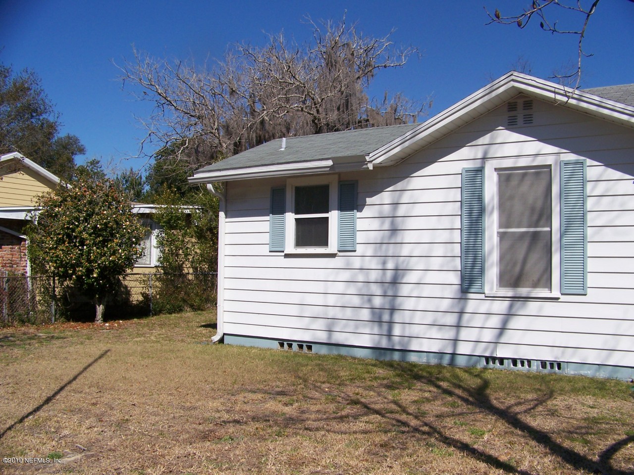 9761 Kline Road Jacksonville, FL 32246 - Photo 69 of 71 a front view of a house with a yard
