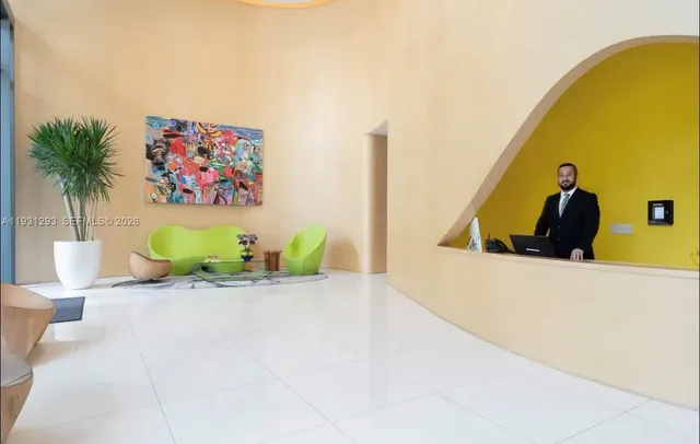 a view of a swimming pool with a potted plant