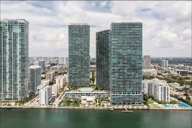 a view of a city with tall buildings