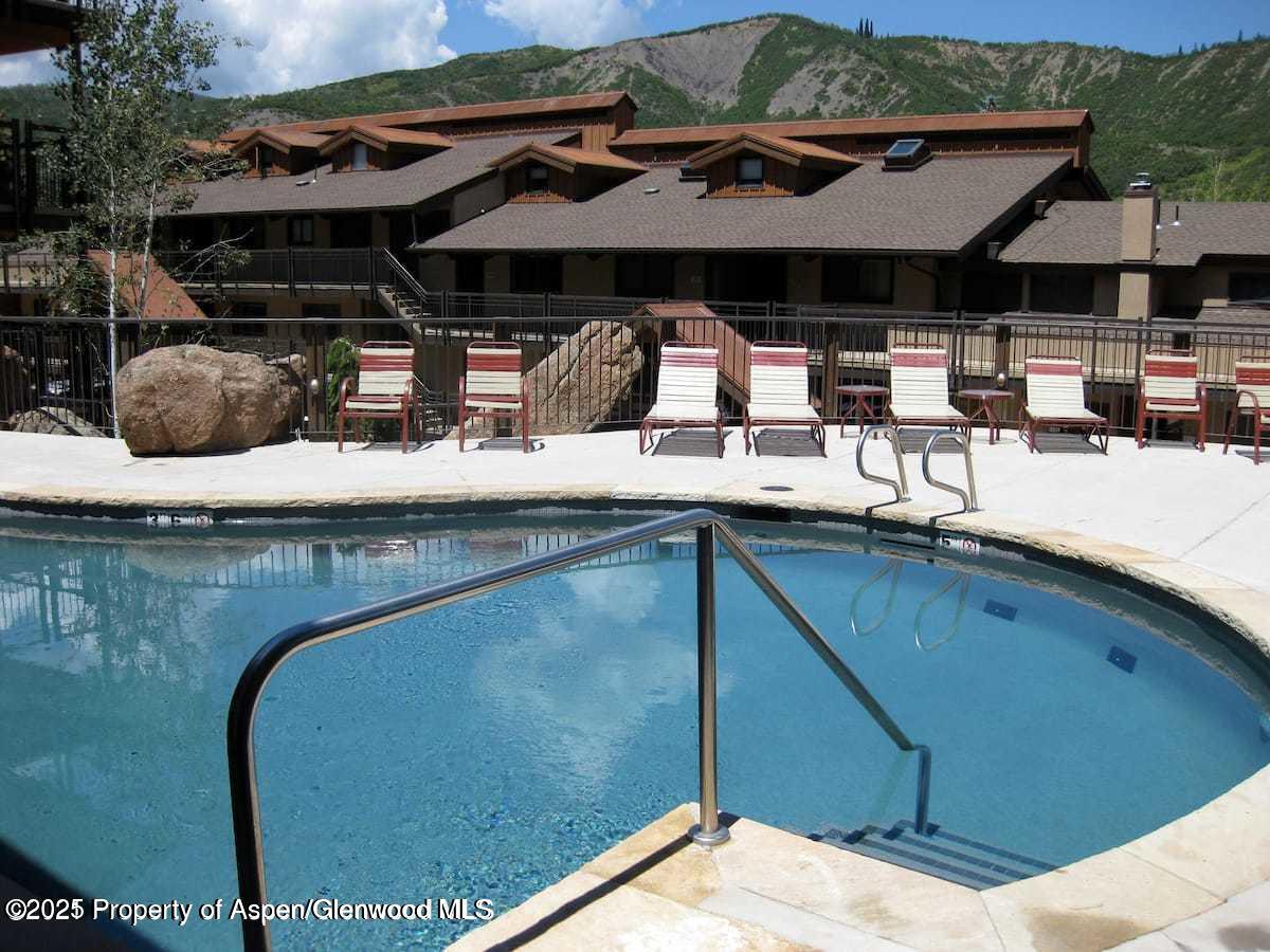 400 Wood Road, Unit 2104B Snowmass Village, CO 81615 - Photo 15 of 18 Crestwood summer pool 2