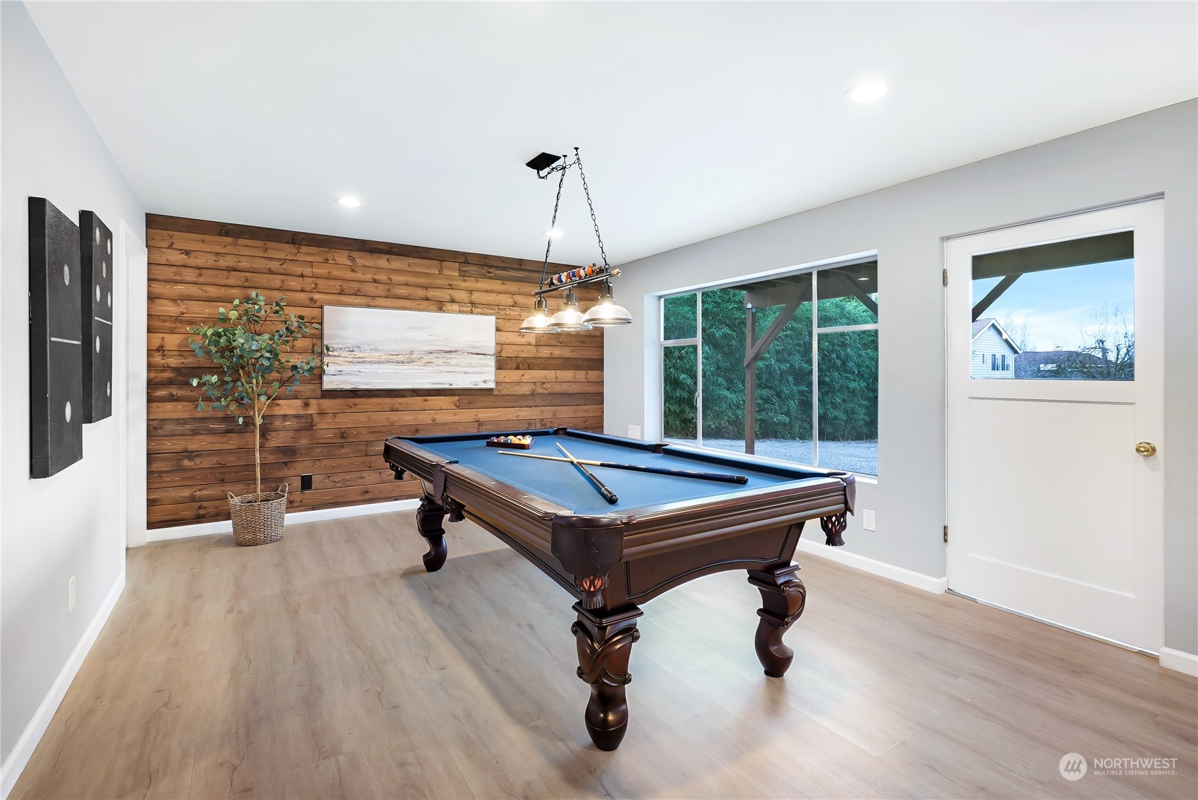3112 Talbot Road South Renton, WA 98055 - Photo 19 of 29 a room with pool table windows and wooden floor