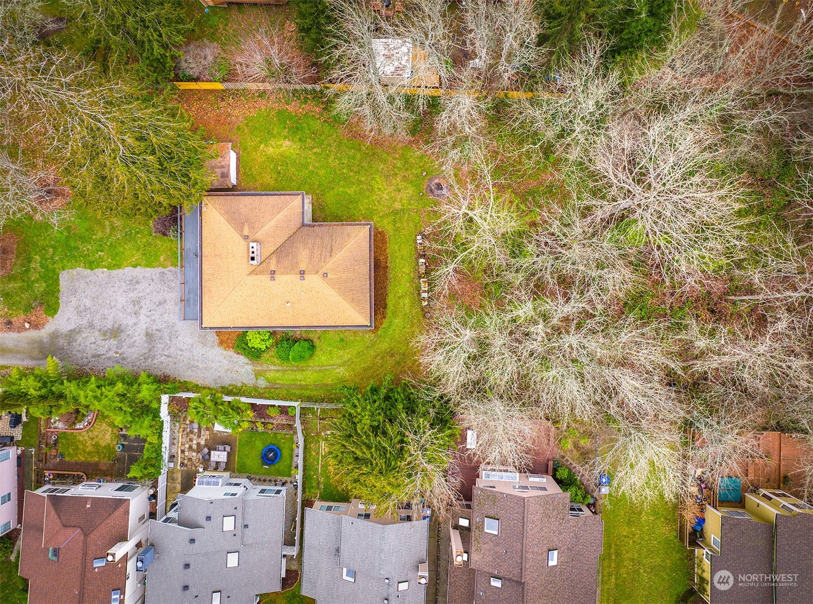3112 Talbot Road South Renton, WA 98055 - Photo 27 of 29 an aerial view of a house with a yard and large trees