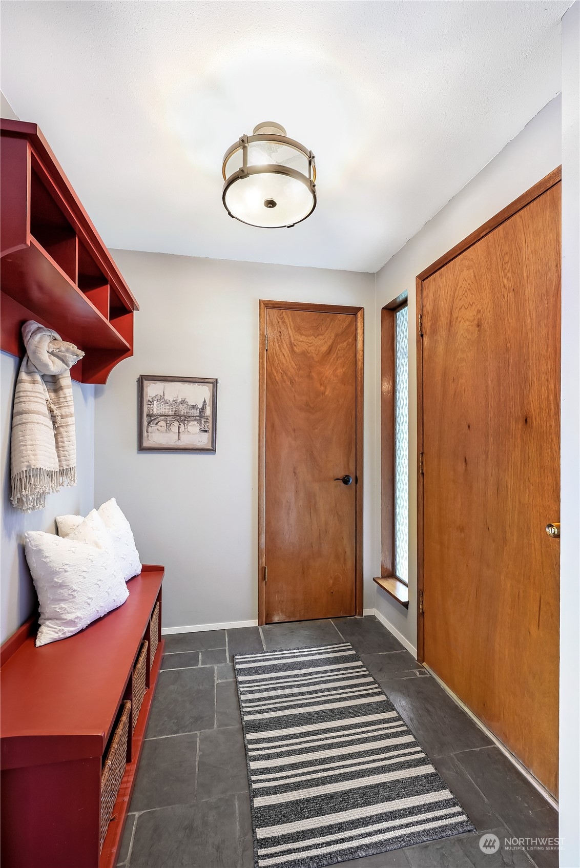 3112 Talbot Road South Renton, WA 98055 - Photo 4 of 29 a bedroom with a bed and a window